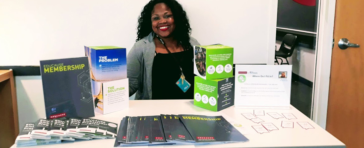 Tonya Bennett at her EDUCAUSE themed booth at her organization's annual faculty retreat
