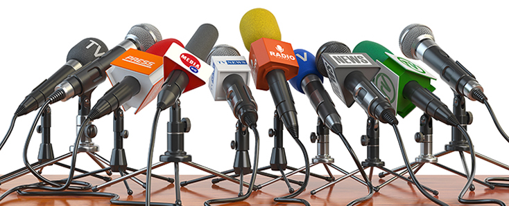 cluster of microphones on a table