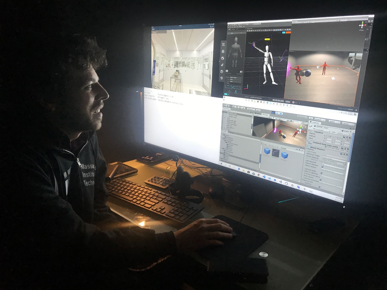 Researchers examine movement data at the MIT Immersion Lab.