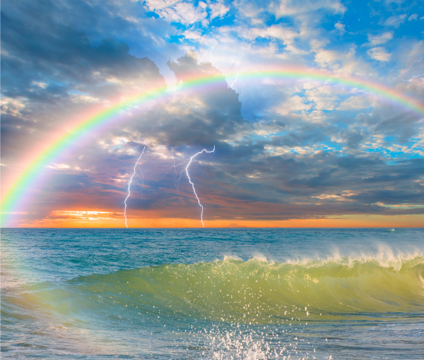rainbow with lightning over water
